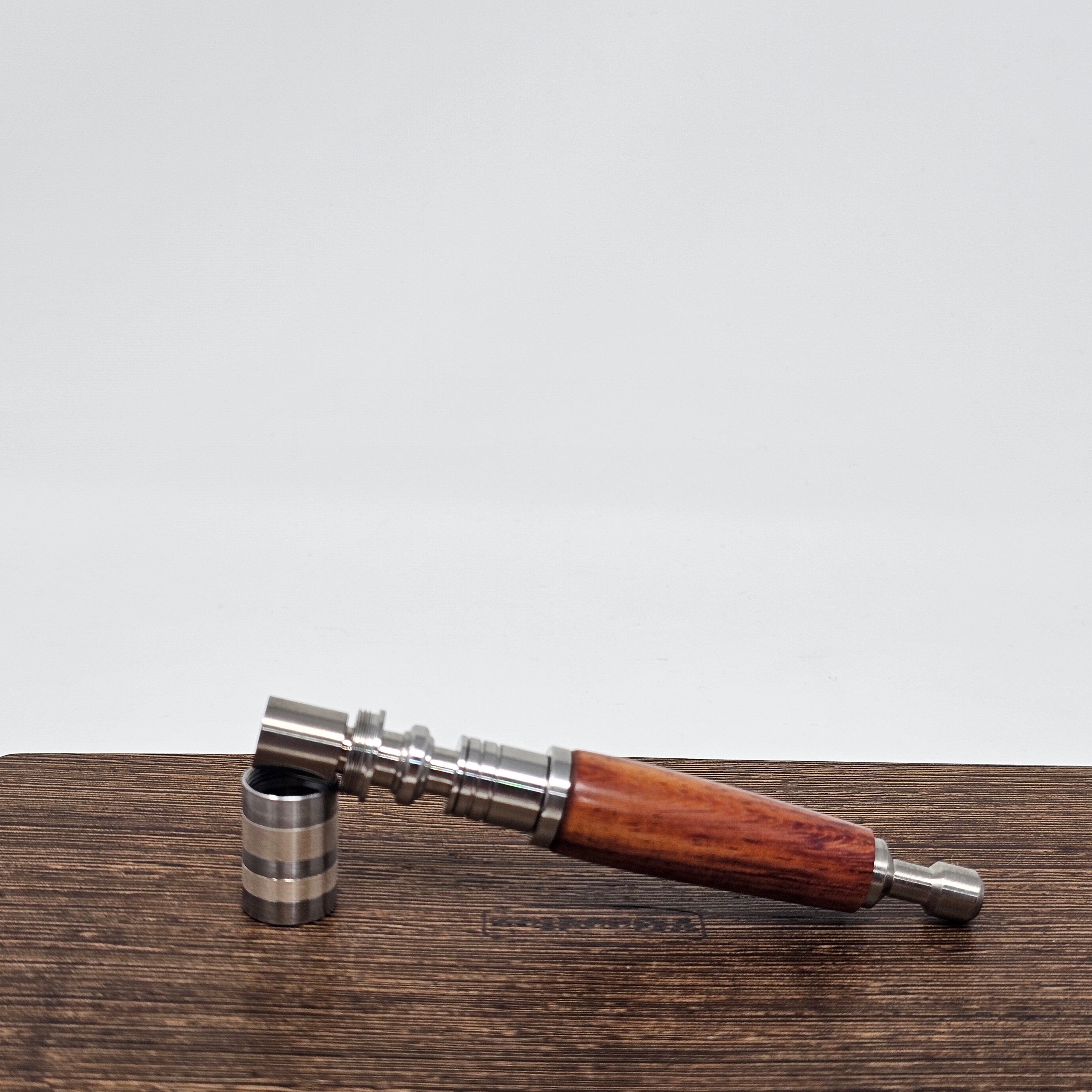 New features include a long-tail titanium chamber for cooler vapor, reduced threads for easier handling, a half-bowl setting for smaller sessions, enhanced flavor, an XL chamber for larger loads, customizable 95% silver rings for MTL or DRL vaporization, medical-grade 316 stainless steel components, an improved thermal disc with higher temp settings, a thicker cap for consistent performance, hands-free heating, superior vapor cooling, and easy cleaning.