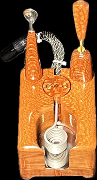 Made in a small family shop in the Southeast United States, each system is unique. This is a true conversation piece of functional art! Each set may contain different parts and of course will offer an individual mixture of woods and beauty only nature can provide.

This particular set includes:

Handmade Leopardwood Dock with Coil Clamp
Leopardwood Wireless Handle and Bowl Set
Scoop and Stir Tool
Optional 25mm Axial Coil
Optional Heater and Bowl Set