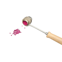 Heater Head Assembly with Top Cap Removed, showing Ruby Beads inside.