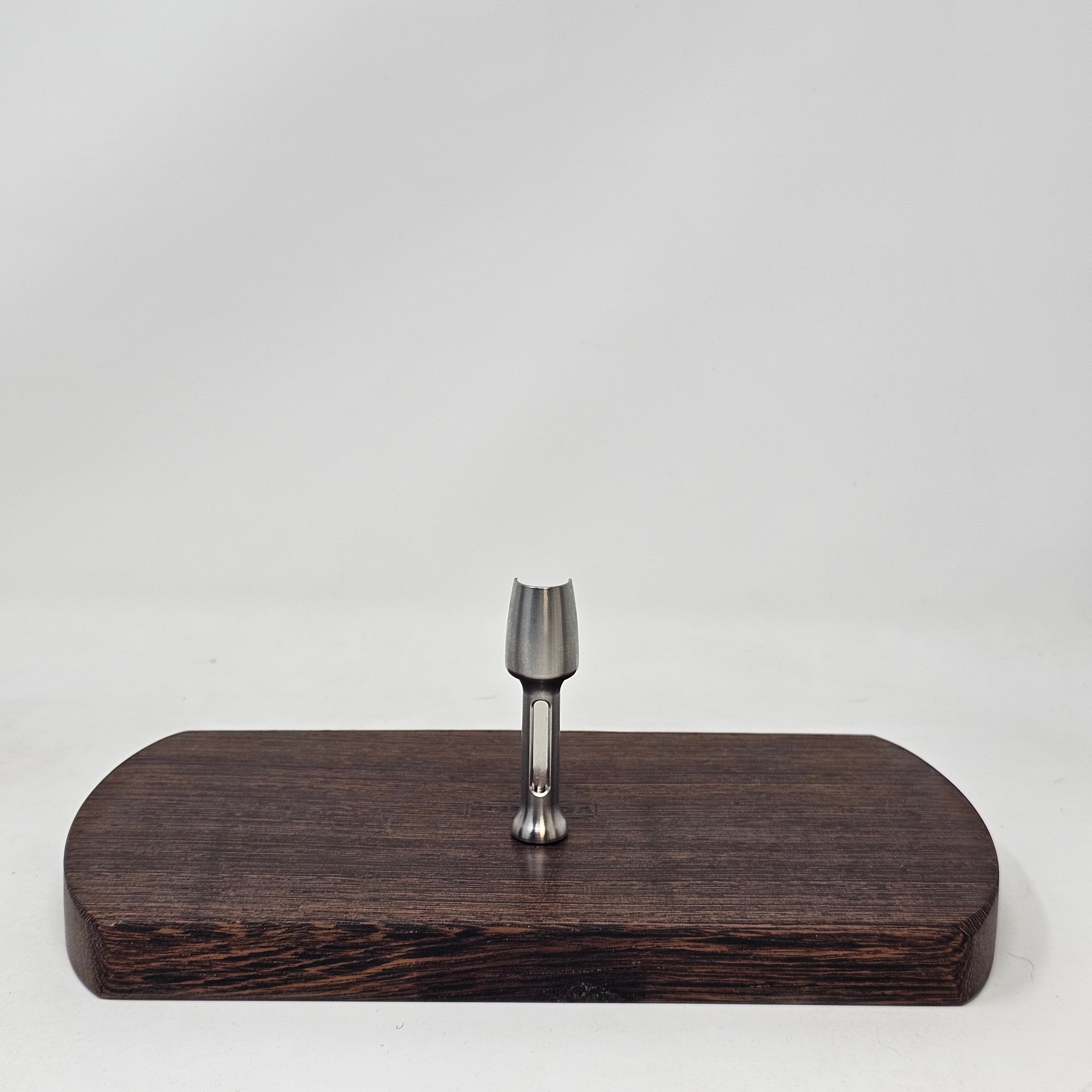 Made of 304SS.&nbsp; This herb scoop is beefy and will stand on it's own.&nbsp; Non-magnetic so it won't get pulled by your grinder magnets.&nbsp;&nbsp;

Choose standard or mini size. Herb scoop standard size found in the Titanium Hybrid Ruby Twist Bundle by Crossing Technology.