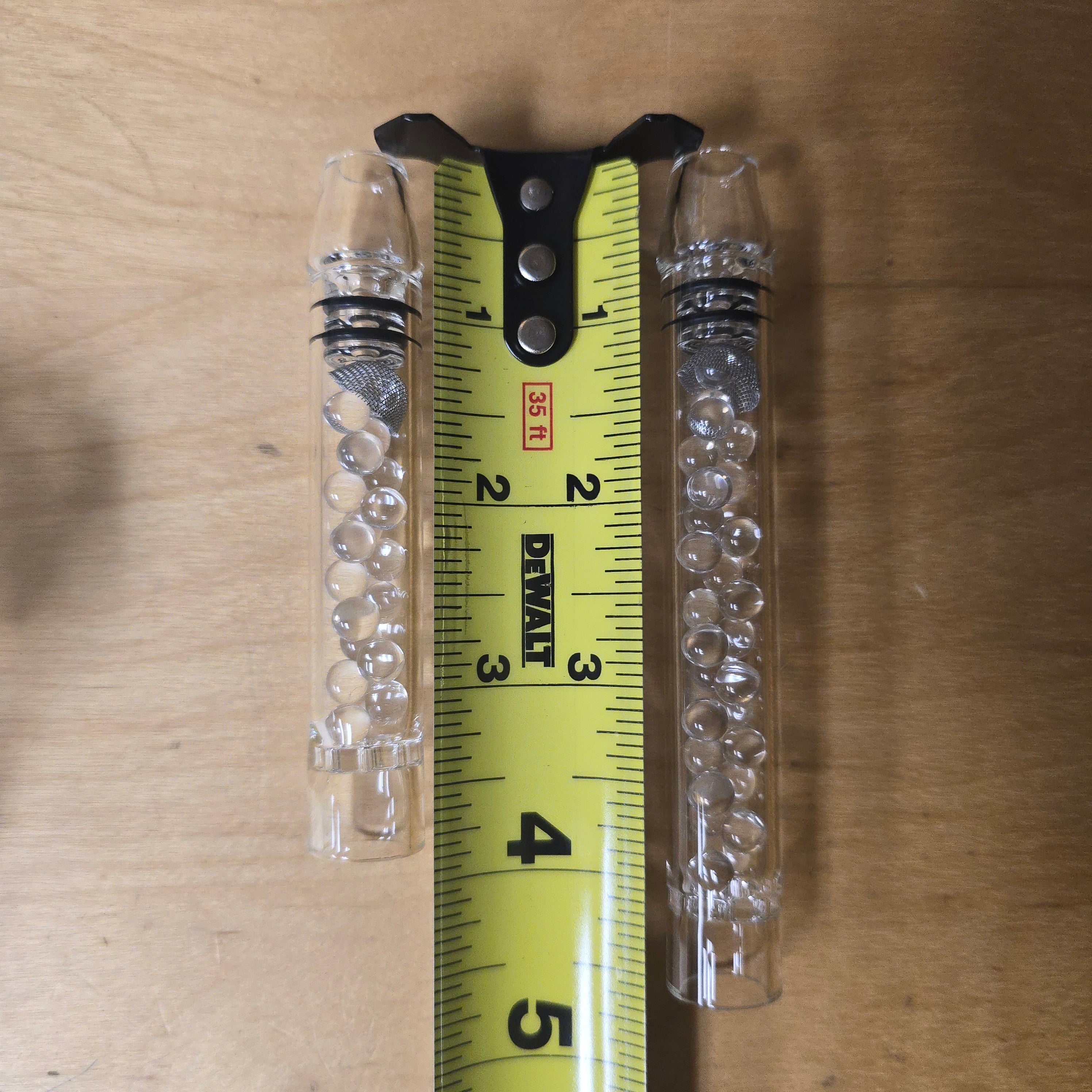 Cool your Tinymight with this bead filled stem! More streamline than our larger Rocket Stem. Includes removable comfort Glass Tip which allows access to the cooling balls for cleaning.

Filled with 6mm quartz balls for cooling. Built in glass screen. Also will accept conical or basket screens as well as dosing caps.