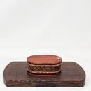 Vapman Case in Redheart/Acrylic/Maple Burl/Bocote.

Handcrafted in the United Kingdom by PhattPiggie.

You are purchasing one Vapman case. No Vapman unit is included. One is shown for demonstration purposes only. Case operates with a rotating magnetic lid.
