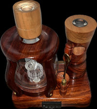 Made in a small family shop in the Southeast United States, each system is unique. This is a true conversation piece of functional art! Each set may contain different parts and of course will offer an individual mixture of woods and beauty only nature can provide.

This particular set includes:

24” whip and 12” wooden mouthpiece with Integrated Orb V2 Bracket System
Integrated PID Controller with US Standard Five Pin XLR Connection w/included Injector Stand
BN-LINK App C Controlled Smart WiFi Outlet Timer