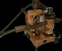 Made in a small family shop in the Southeast United States, each system is unique. This is a true conversation piece of functional art! Each set may contain different parts and of course will offer an individual mixture of woods and beauty only nature can provide.

This particular set includes:

24” whip and 12” wooden mouthpiece with Integrated Orb V2 Bracket System
Integrated PID Controller with US Standard Five Pin XLR Connection w/included Injector Stand
BN-LINK App C Controlled Smart WiFi Outlet Timer