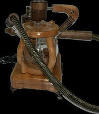 Made in a small family shop in the Southeast United States, each system is unique. This is a true conversation piece of functional art! Each set may contain different parts and of course will offer an individual mixture of woods and beauty only nature can provide.

This particular set includes:

24” whip and 12” wooden mouthpiece with Integrated Orb V2 Bracket System
Integrated PID Controller with US Standard Five Pin XLR Connection w/included Injector Stand
BN-LINK App C Controlled Smart WiFi Outlet Timer