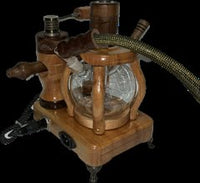 Made in a small family shop in the Southeast United States, each system is unique. This is a true conversation piece of functional art! Each set may contain different parts and of course will offer an individual mixture of woods and beauty only nature can provide.

This particular set includes:

24” whip and 12” wooden mouthpiece with Integrated Orb V2 Bracket System
Integrated PID Controller with US Standard Five Pin XLR Connection w/included Injector Stand
BN-LINK App C Controlled Smart WiFi Outlet Timer