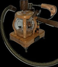 Made in a small family shop in the Southeast United States, each system is unique. This is a true conversation piece of functional art! Each set may contain different parts and of course will offer an individual mixture of woods and beauty only nature can provide.

This particular set includes:

24” whip and 12” wooden mouthpiece with Integrated Orb V2 Bracket System
Integrated PID Controller with US Standard Five Pin XLR Connection w/included Injector Stand
BN-LINK App C Controlled Smart WiFi Outlet Timer