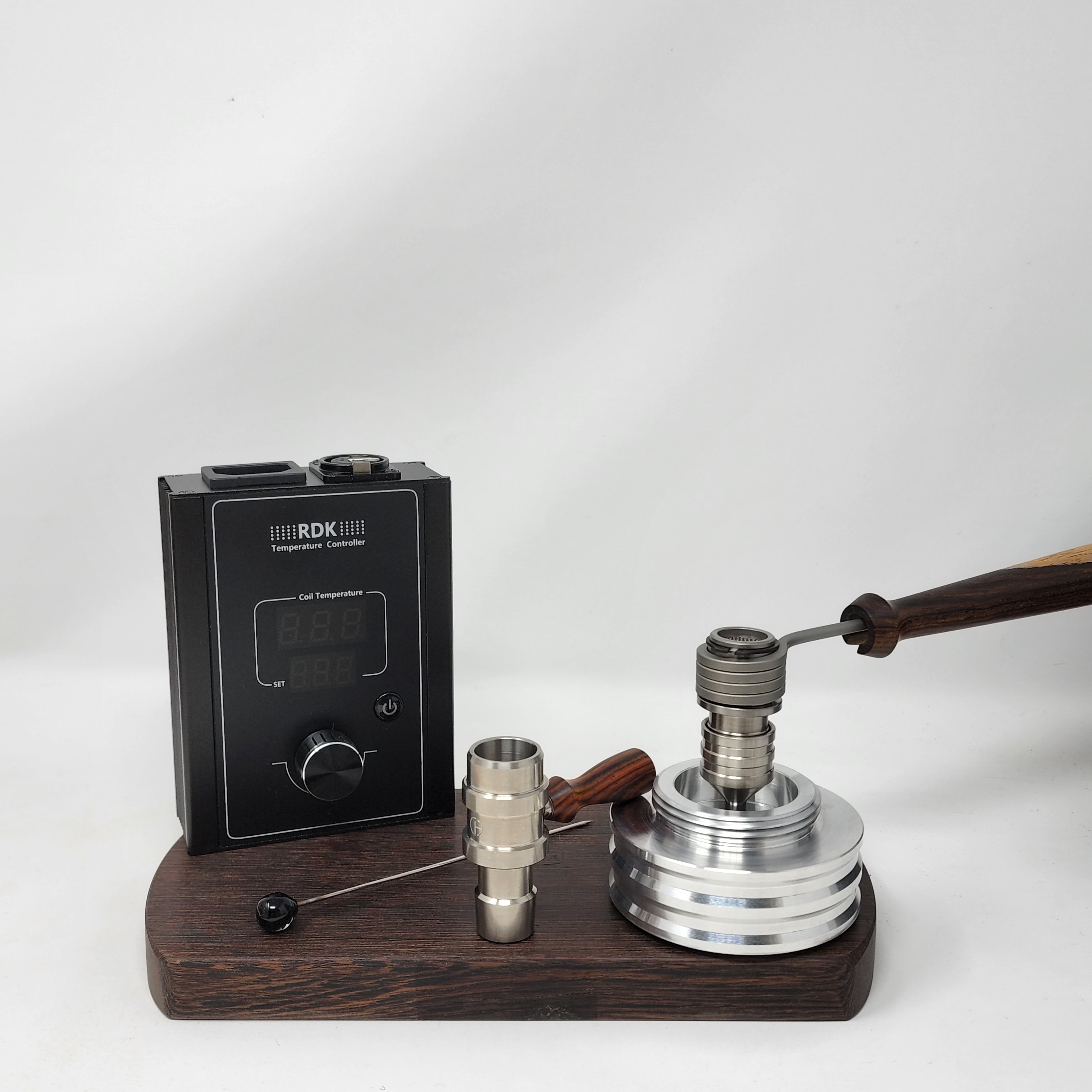 The B-Zero is the latest iteration of the "B" series of heads. This time, it is a single piece "ball" device inspired by the different DIY devices appearing in the community, namely the DIY device put together by "secreagent" which involved the CH 18mm posts and a 16mm coil.

CH removed the machined screen (extra mass) and replaced with a second 5/8 double weave screen located directly below the coil. They also increased the mass to fit one of our 20mm Flowerpot coils.
