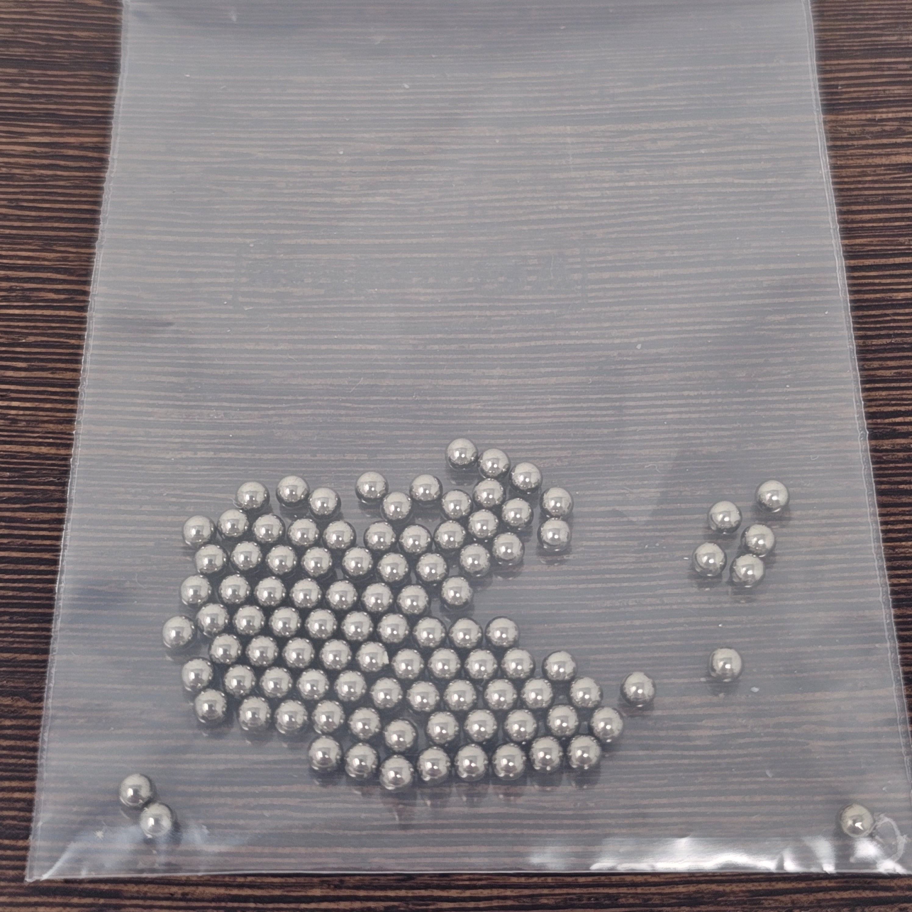 These 3mm Titanium beads / balls / spheres have a number of different purposes.

Pouch (1g) is filled with ~6g of beads or more. 90-100 3mm Titanium beads.

Medical Grade GR2 Titanium.