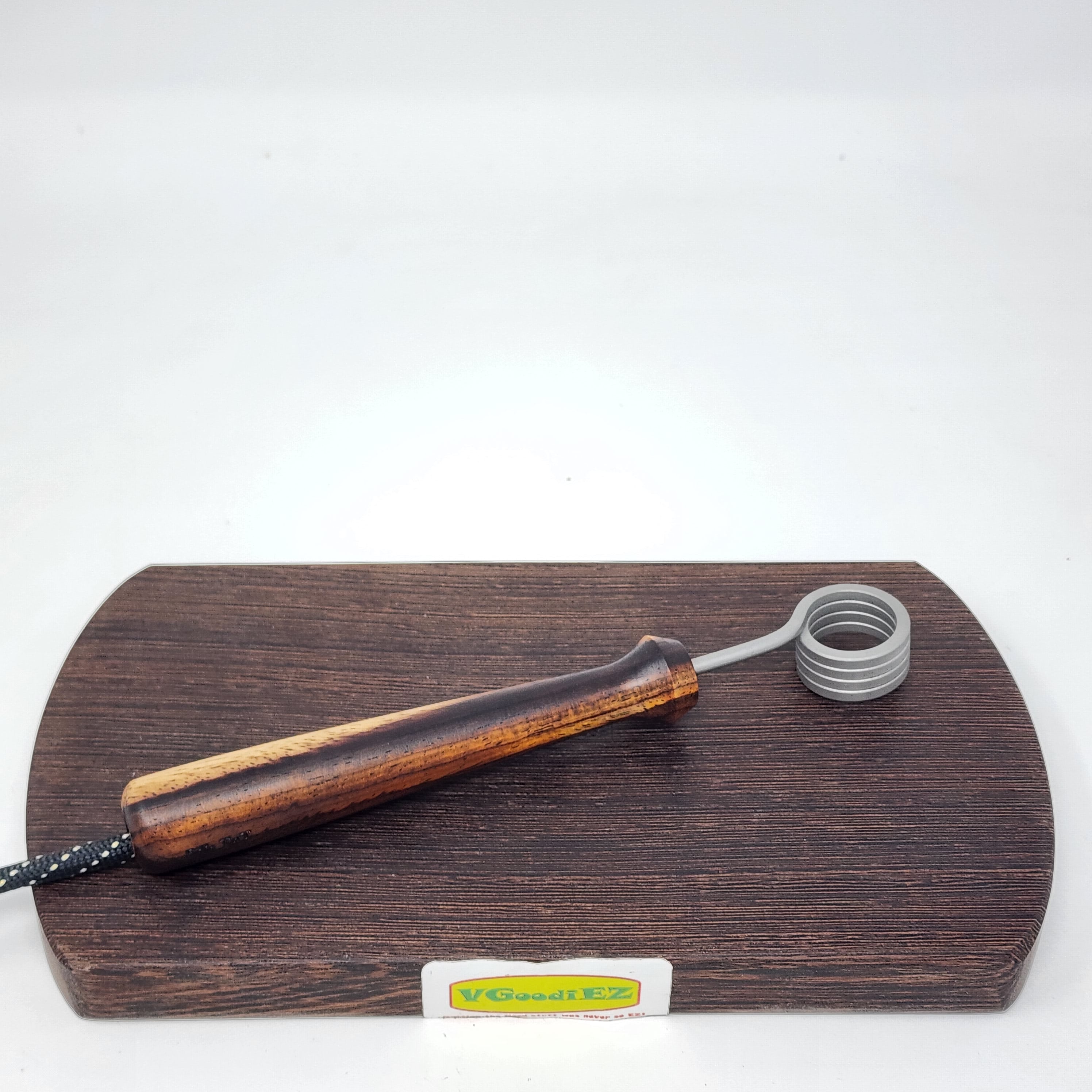 Crafted in Mississippi, this handled is not only beautiful but it makes for comfortable handling of your hot coil runners. Fits best with 20mm coils by Cannabis Hardware or Auber and requires no modification other than maybe a little electrical tape to keep it perfectly set. Will work with coils by Disorderly Conduction by removing the black rubber sheath around the coil clamp. Will NOT work with Auber 16mm coils.