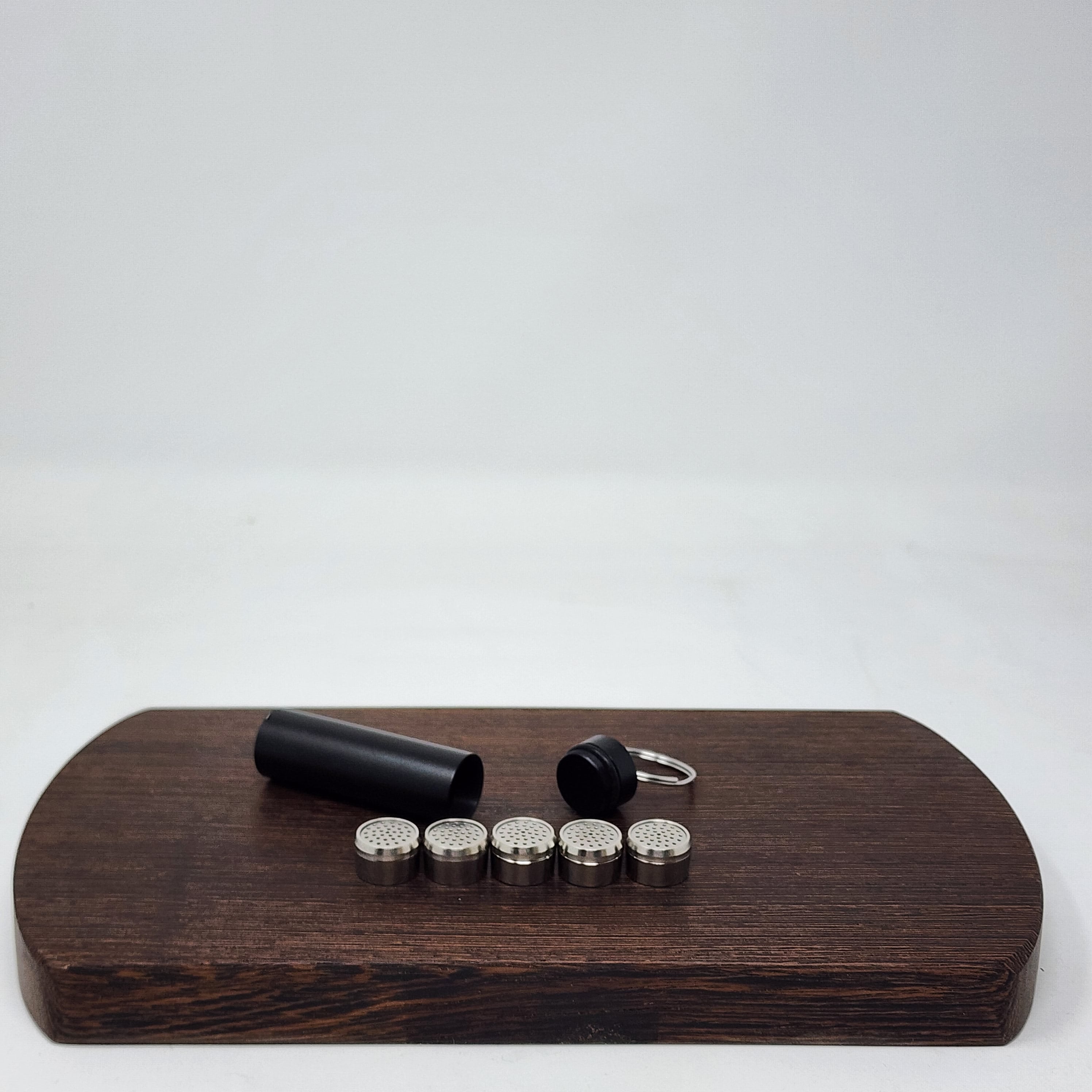 Choose from Titanium or 304 stainless steel. The pods can be filled and swapped quickly. Five per package, includes capsule caddy with smell proof seal and key ring. Great substitute for the aluminum dosing capsules that are more common for the Crafty/Mighty/Venty/Volcano.