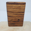 The Sticky Brick Junior is our butane-powered portable. Measuring 4.5 inches tall, 3 inches wide, and 1 inch thick, it will fit right in your pocket or bag to take on the go. The protective cap secures with the same extra-strong, rare earth magnets that we use in all of our devices. As with all of our Sticky Bricks, the wooden body and the glass are worked by hand right here in our workshop.