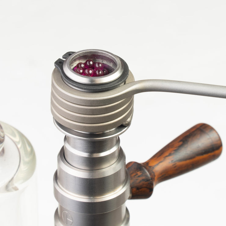 The B-Zero is the latest iteration of the "B" series of heads. This time, it is a single piece "ball" device inspired by the different DIY devices appearing in the community, namely the DIY device put together by "secreagent" which involved the CH 18mm posts and a 16mm coil.

CH removed the machined screen (extra mass) and replaced with a second 5/8 double weave screen located directly below the coil. They also increased the mass to fit one of our 20mm Flowerpot coils.