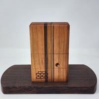 The Sticky Brick Junior is our butane-powered portable. Measuring 4.5 inches tall, 3 inches wide, and 1 inch thick, it will fit right in your pocket or bag to take on the go. The protective cap secures with the same extra-strong, rare earth magnets that we use in all of our devices. As with all of our Sticky Bricks, the wooden body and the glass are worked by hand right here in our workshop.