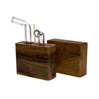 The Sticky Brick Junior is our butane-powered portable. Measuring 4.5 inches tall, 3 inches wide, and 1 inch thick, it will fit right in your pocket or bag to take on the go. The protective cap secures with the same extra-strong, rare earth magnets that we use in all of our devices. As with all of our Sticky Bricks, the wooden body and the glass are worked by hand right here in our workshop.