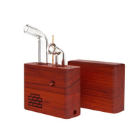 The Sticky Brick Junior is our butane-powered portable. Measuring 4.5 inches tall, 3 inches wide, and 1 inch thick, it will fit right in your pocket or bag to take on the go. The protective cap secures with the same extra-strong, rare earth magnets that we use in all of our devices. As with all of our Sticky Bricks, the wooden body and the glass are worked by hand right here in our workshop.