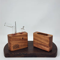 The Sticky Brick Junior is our butane-powered portable. Measuring 4.5 inches tall, 3 inches wide, and 1 inch thick, it will fit right in your pocket or bag to take on the go. The protective cap secures with the same extra-strong, rare earth magnets that we use in all of our devices. As with all of our Sticky Bricks, the wooden body and the glass are worked by hand right here in our workshop.