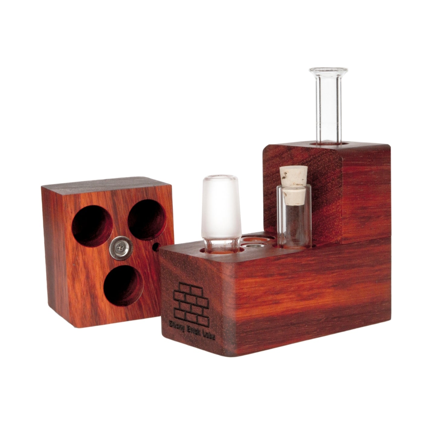 The Sticky Brick Maxx is available in a variety of wood choices. Ships with a torch, 18mm female, 18mm male, and 14mm male whip connectors along with 16” of silicone whip tubing, 18mm female dry mouthpiece, 6-pack of screens, carb corks, an extra jar cork, and led tweezers. Now ships with two Restrictor Discs.