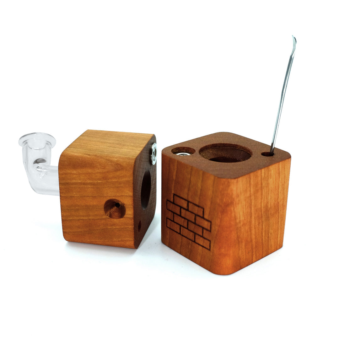 The Twist by Sticky Brick Labs is a versatile thermal extractor that can be butane torch-powered or used with a heated injector to pair with your favorite water piece.

The Twist is proudly Hand Made in the USA here in North Carolina. The lumber is sourced locally from vendors that prioritize sustainability and top quality. Our glass parts are made in-house using the highest quality scientific German glass.