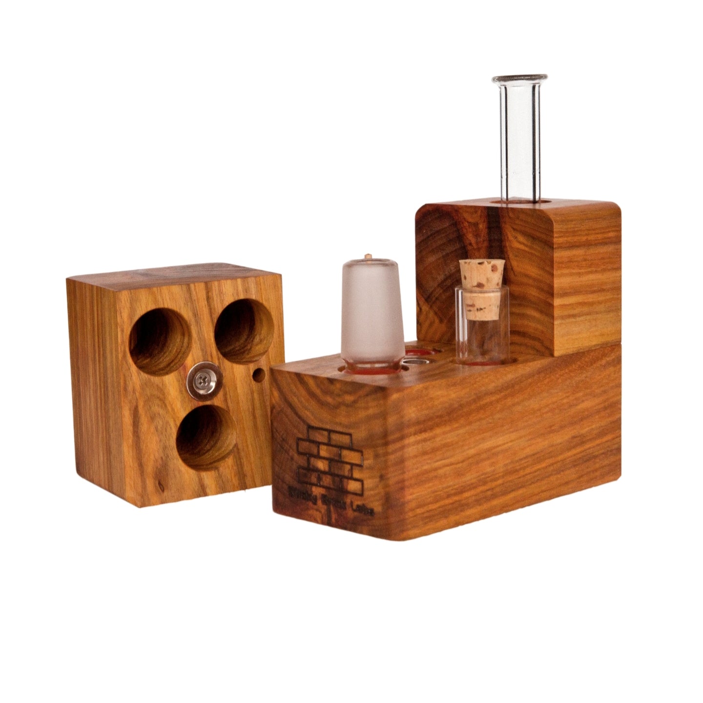 The Sticky Brick Maxx is available in a variety of wood choices. Ships with a torch, 18mm female, 18mm male, and 14mm male whip connectors along with 16” of silicone whip tubing, 18mm female dry mouthpiece, 6-pack of screens, carb corks, an extra jar cork, and led tweezers. Now ships with two Restrictor Discs.