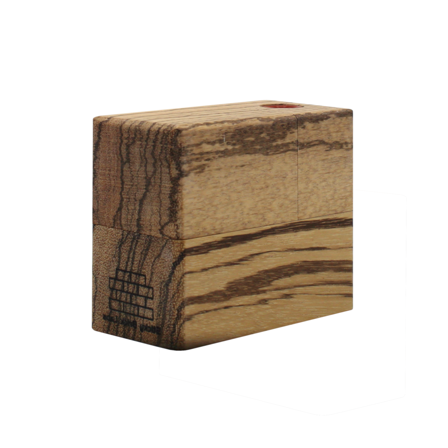 The Sticky Brick Maxx is available in a variety of wood choices. Ships with a torch, 18mm female, 18mm male, and 14mm male whip connectors along with 16” of silicone whip tubing, 18mm female dry mouthpiece, 6-pack of screens, carb corks, an extra jar cork, and led tweezers. Now ships with two Restrictor Discs.