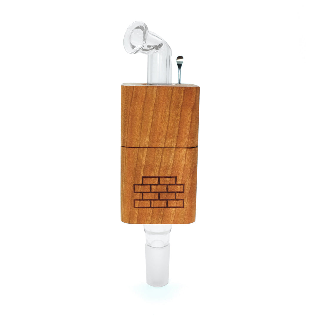 The Twist by Sticky Brick Labs is a versatile thermal extractor that can be butane torch-powered or used with a heated injector to pair with your favorite water piece.

The Twist is proudly Hand Made in the USA here in North Carolina. The lumber is sourced locally from vendors that prioritize sustainability and top quality. Our glass parts are made in-house using the highest quality scientific German glass.